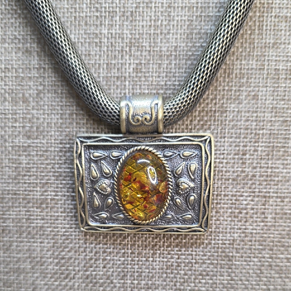 Elegant Silver and Gold Pendant Necklace